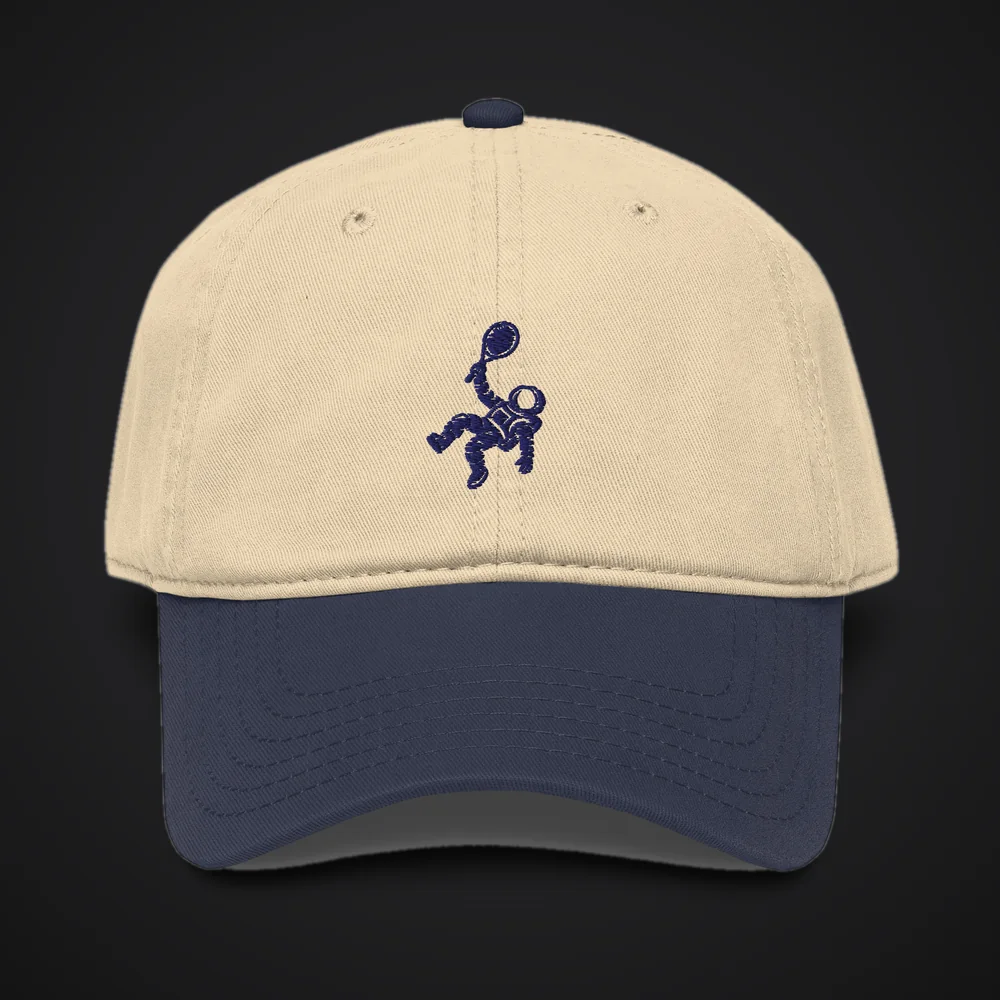 The Event Horizon in khaki with a navy brim and the navy embroidered astronaut on the front